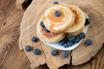 Fritters with blueberries, high angle view, studio shot