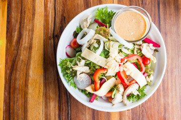 Chicken cheese salad with caesar dressing