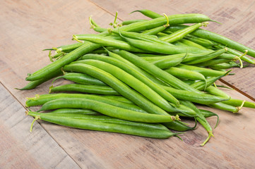 Fresh green beans on table