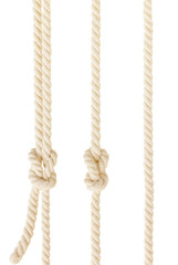 Naklejka premium ship ropes with knot isolated on white background