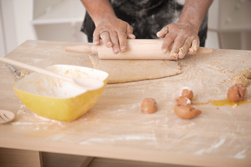 Baker preparing dough