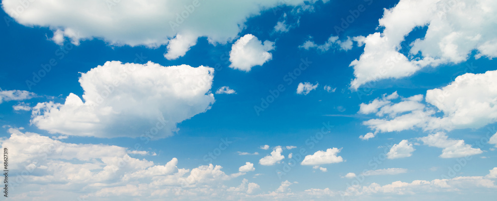 Wall mural blue sky background with clouds