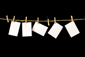 Paper, Blank pieces of paper hang on clothesline