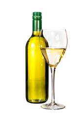 Glass of  white wine with bottle