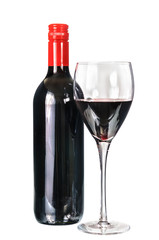 Glass of red  wine with bottle