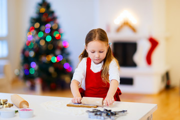 Girl baking Christmas cookies