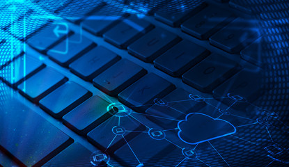 Keyboard with glowing cloud technology icons