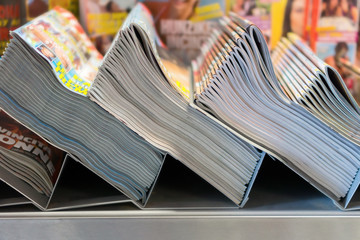 piles of magazines in the kiosk
