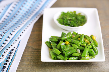 Salad with green beans and corn with sauce