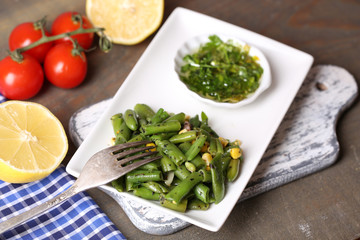 Salad with green beans and corn, and sauce