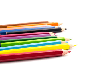 colorful pencils on white background