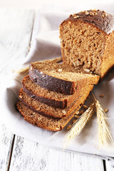 Fresh bread on wooden table, close up