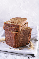 Fresh bread on wooden table, close up