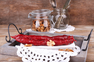 Tasty oriental sweets (churchkhela) and fresh nuts,