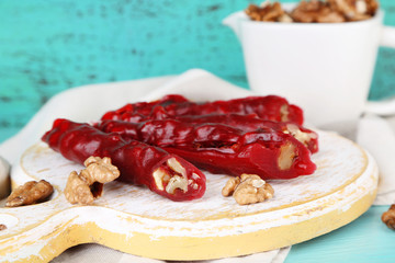 Tasty oriental sweets (churchkhela) and fresh nuts