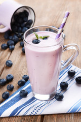 Delicious dessert with blueberries on table close-up