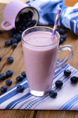 Delicious dessert with blueberries on table close-up