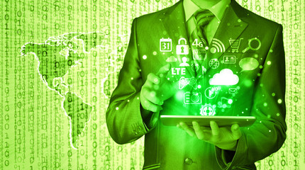 Business man use tablet pc with colorful application icons