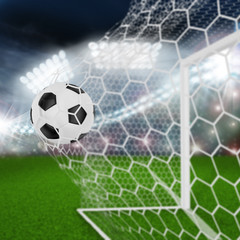 soccer ball in goal net