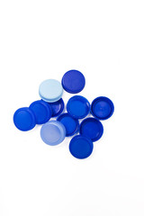  bunch of blue plastic caps from bottles of water 