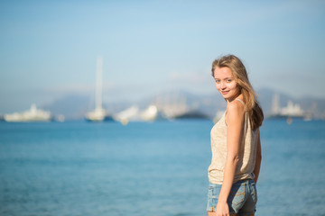 Beautiful girl on the beach in Cannes, France