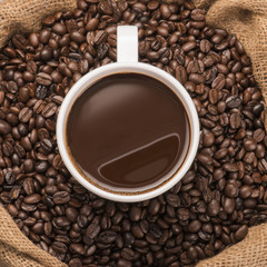 Hot Cup of Coffee With Coffee Beans