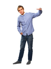 Fototapeta premium Full-length portrait of a young college guy, isolated on white