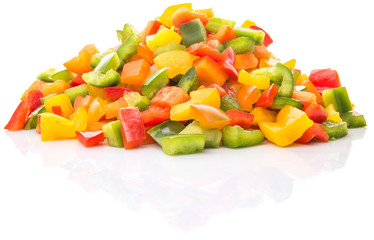 Colorful mix chopped capsicums over white background