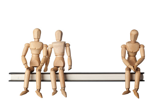 Relationship between three people depicted by three figurines