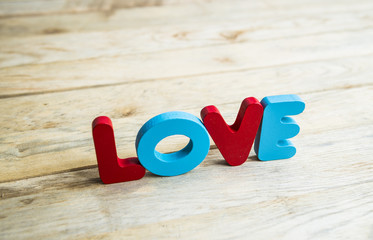 Colorful wooden word Love on wooden floor6