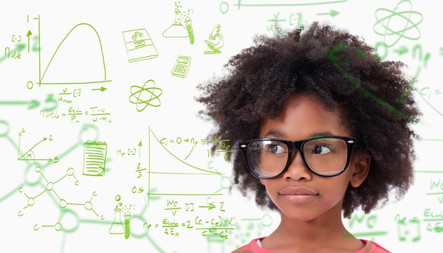 Composite image of cute pupil wearing glasses - Powered by Adobe