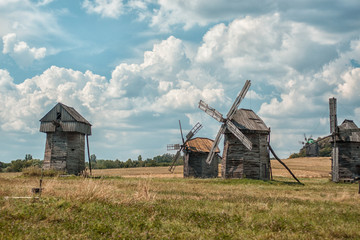 Fototapeta na wymiar Old wooden windmills.