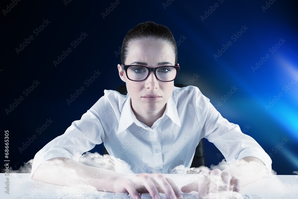 Aufkleber Composite image of businesswoman typing on a keyboard