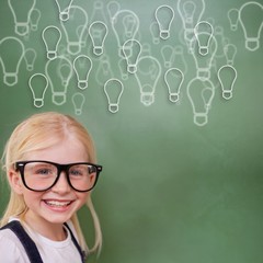 Composite image of cute pupil smiling