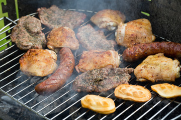barbecue with delicious grilled meat on grill