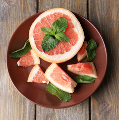 Ripe chopped grapefruit with mint leaves