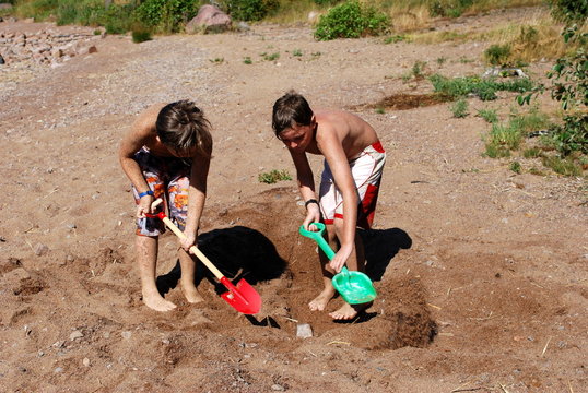 Im Sand eingraben