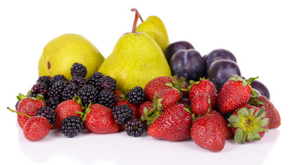 Ripe fruits and berries isolated on white
