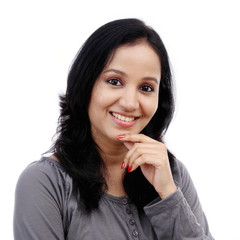 Fototapeta premium Portrait of young woman against white