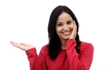 Smiling young woman showing isolated presentation
