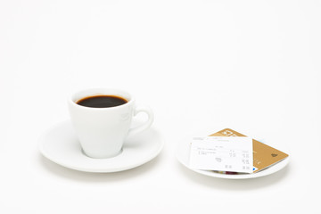 Cup of coffee with bill