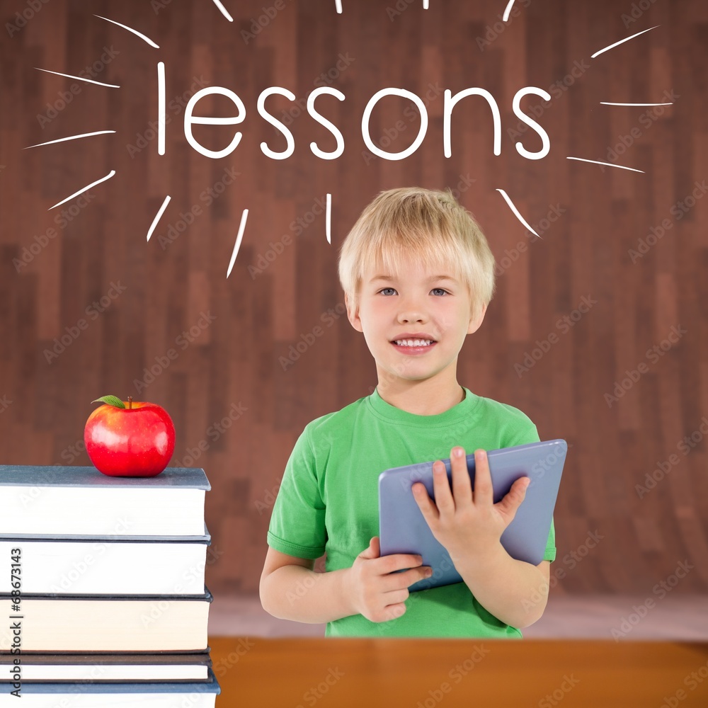 Poster lessons against red apple on pile of books