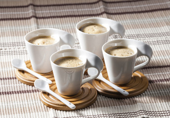 cups of coffee on place mats