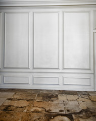 White wooden paneling above a flagstone floor