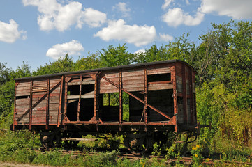 Fototapeta na wymiar Old abandoned railway wagon