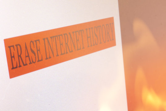 Erase Internet History Sign On A Computer Screen And Flames