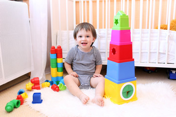 lovely baby playing toys