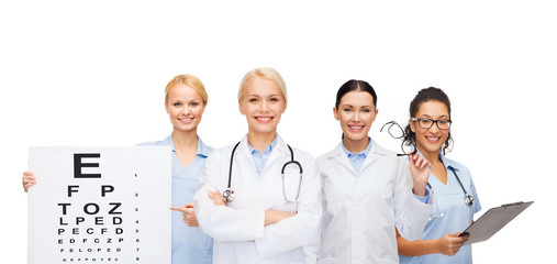 Fototapeta na wymiar smiling female eye doctors and nurses