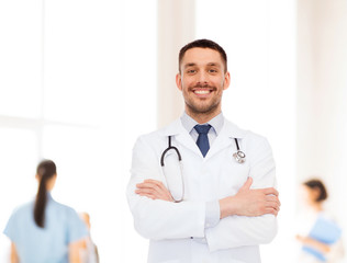 smiling male doctor with stethoscope