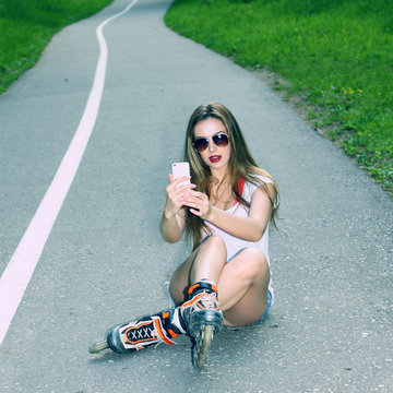  Outdoor lifestyle. Nice girl doing Selfie.
